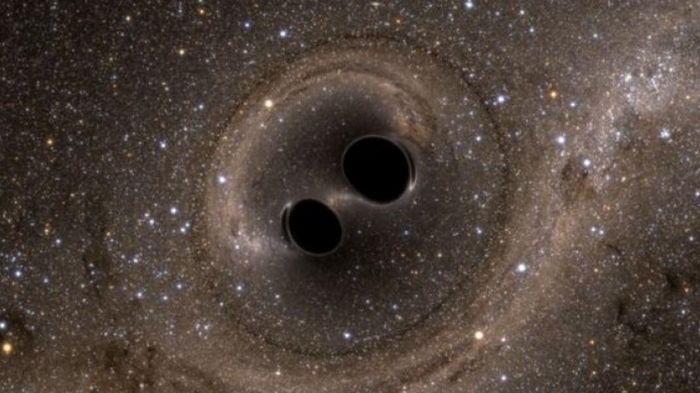 Слияние черных дыр происходит в неожиданном месте в космосе: что выяснили ученые