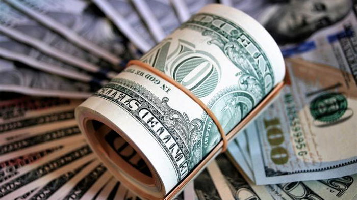 Национальный банк снизил официальный курс доллара