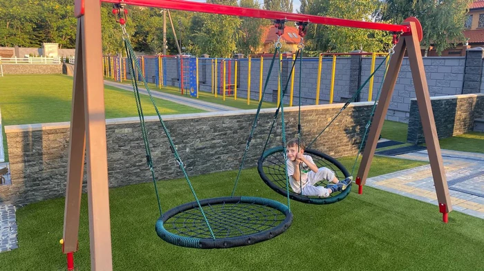 качели-гнездо